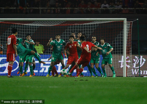 China leads Iraq 1-0 in 2015 Asian Cup qualifier