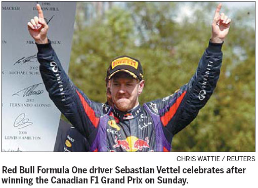 Vettel staying with Red Bull to end of 2015