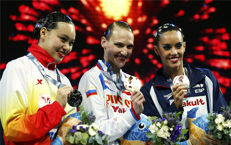 Russia gets gold in solo free routine of synchronized swimming