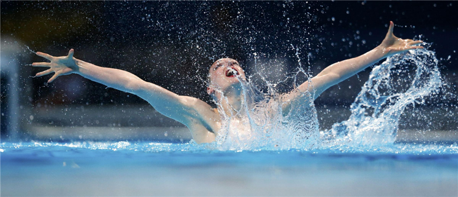 Russia gets gold in solo free routine of synchronized swimming