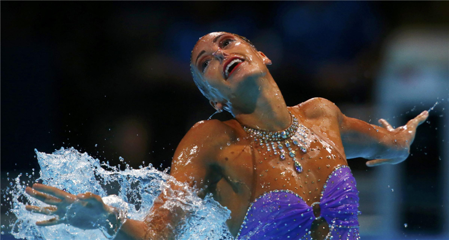 Russia gets gold in solo free routine of synchronized swimming