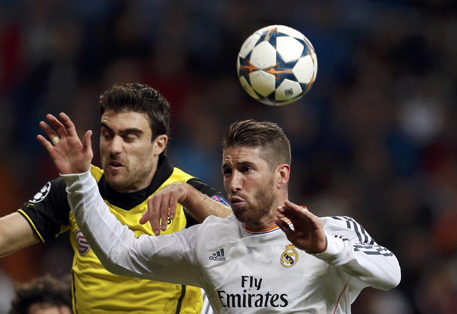PSG sinks Chelsea, Real eases past Dortmund