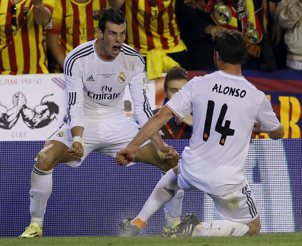 Bale leads Madrid 2-1 past Barca for Copa del Rey