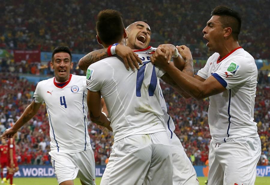 Spain's reign ends as Chile prove too hot to handle