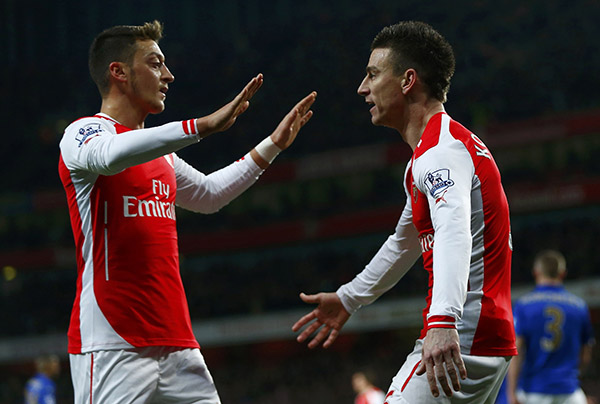 Arsenal capitalise on Tottenham defeat to climb into top four