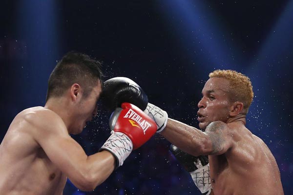 Zou loses to Amnat in IBF flyweight title challenge