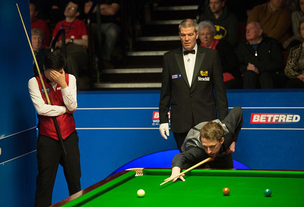Ding Junhui reaches last eight at snooker worlds, O'Sullivan crashes out