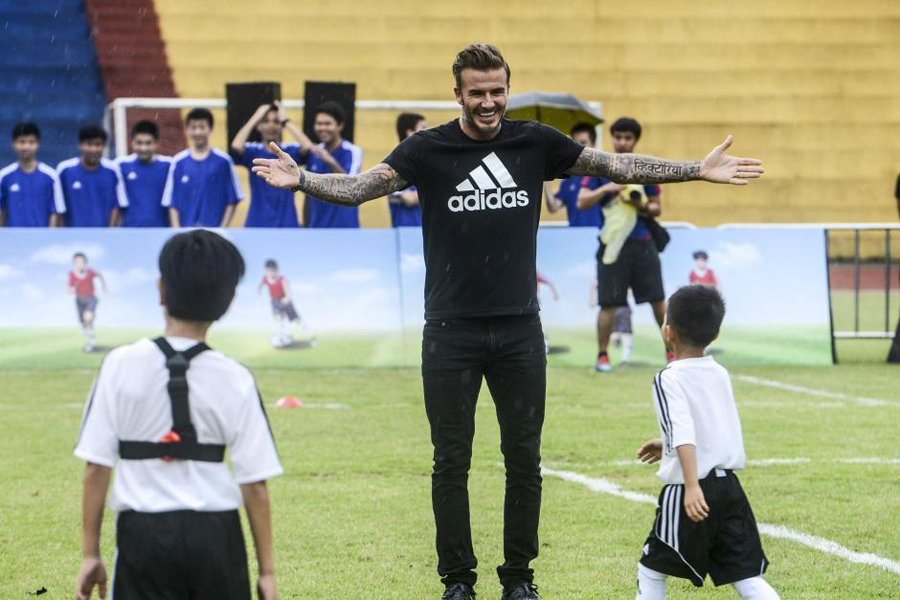 David Beckham promotes football in South China school