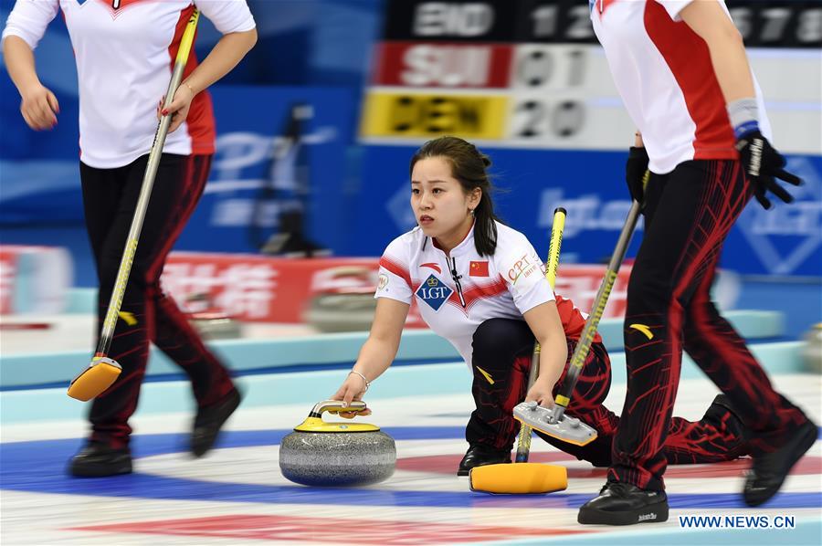 China suffer third straight defeat at curling championships