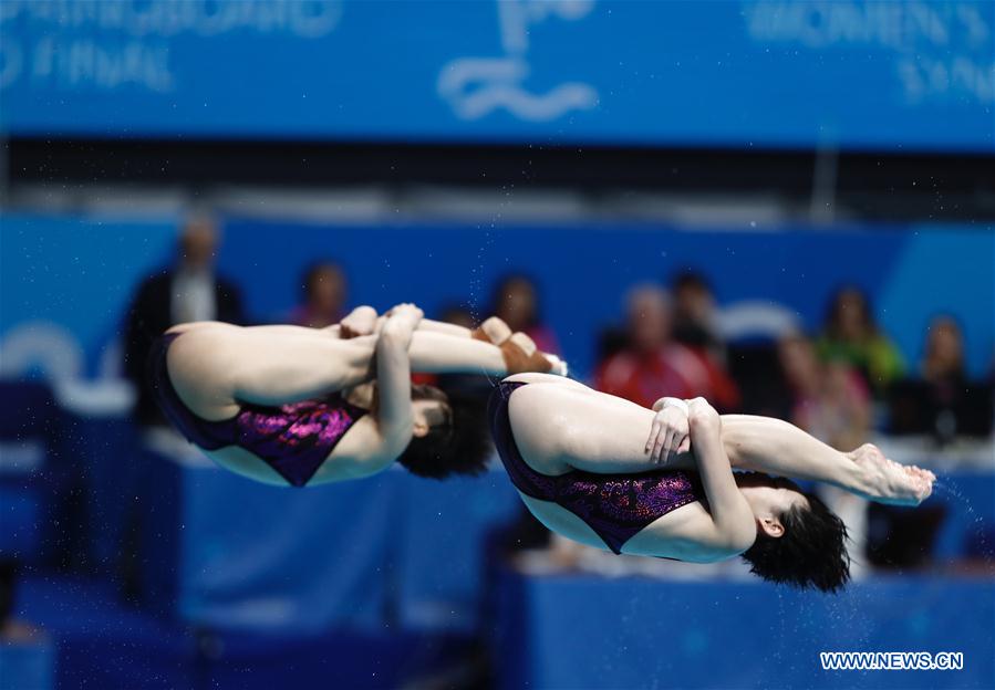 Chinese divers add two synchronized gold medals at the worlds