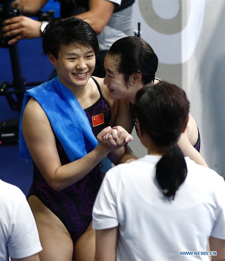 Chinese divers add two synchronized gold medals at the worlds