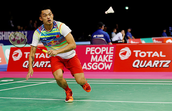 China's Super Dan and Shi reach second round at badminton worlds