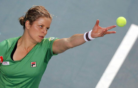 Clijsters survives scare to progress in Paris Open