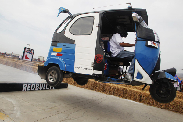 Three-wheeled taxi vehicle race in Peru