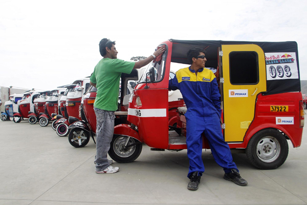 Three-wheeled taxi vehicle race in Peru