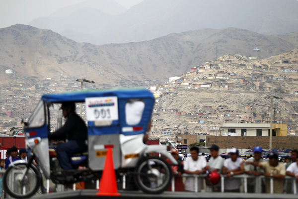 Three-wheeled taxi vehicle race in Peru