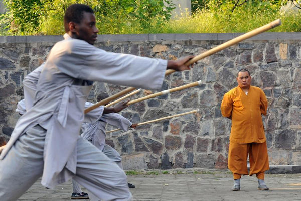 African apprentices practise kungfu at Shaolin Temple