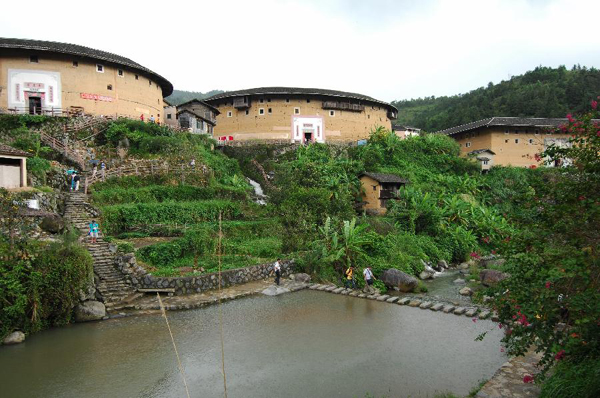 Tourists visit Tulous in Yongding, China's Fujian