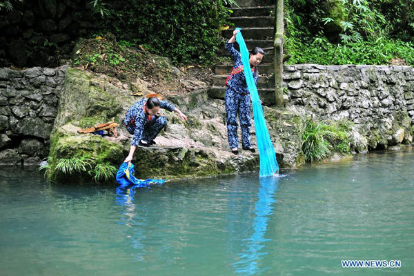 Three-Gorges Tribe Scenic Spot attracts tourists in C China