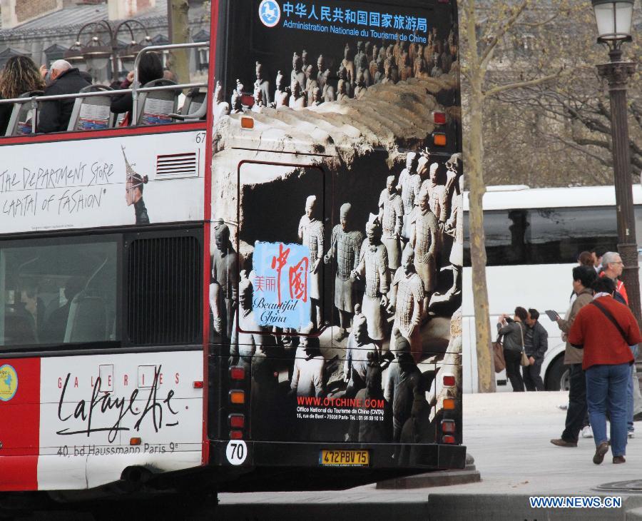 Tourist bus presents charm of China's tourism in Paris