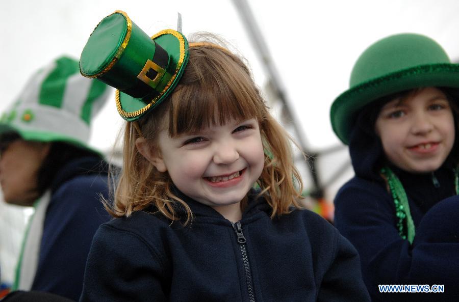 People take part in St. Patrick's Day Parade in Vancouver