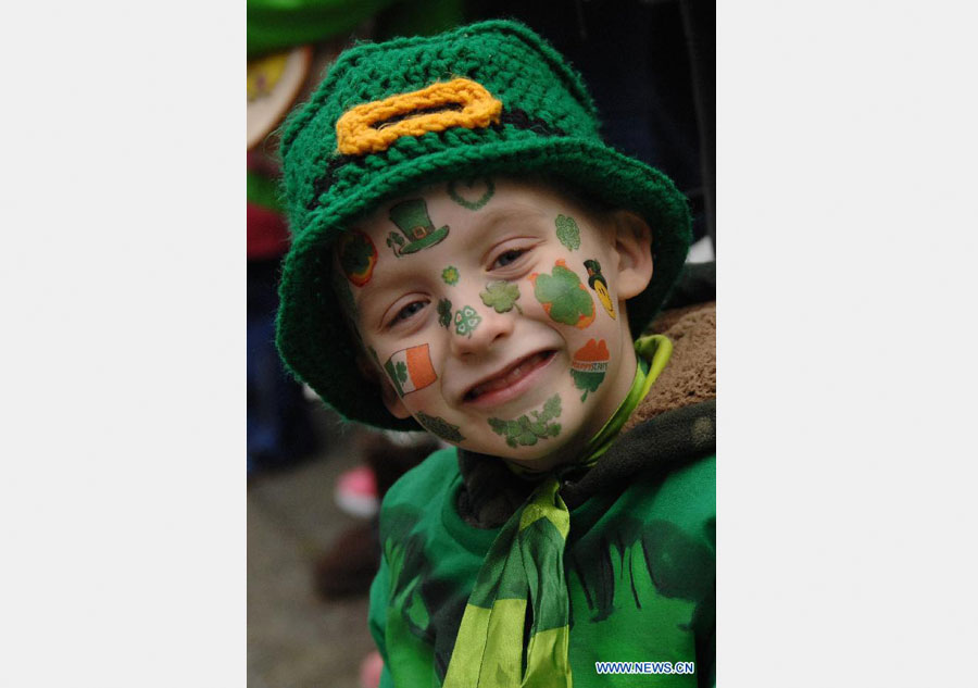 People take part in St. Patrick's Day Parade in Vancouver