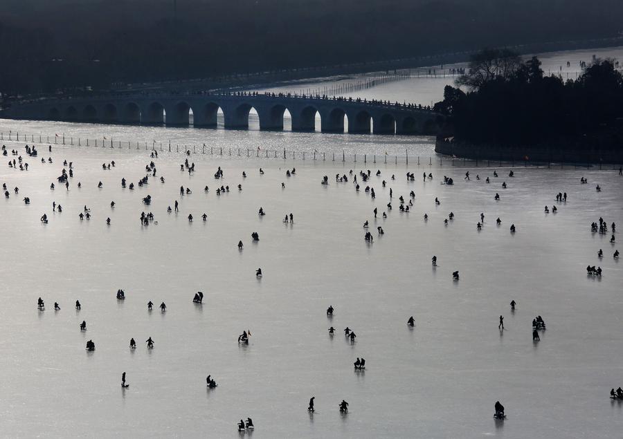 People skate on frozen Kunming Lake of Summer Palace