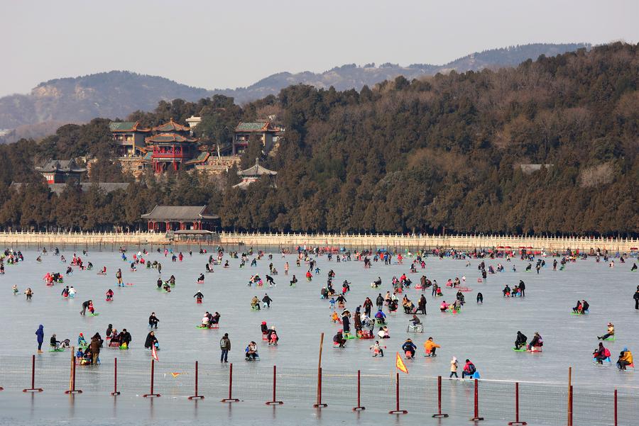 People skate on frozen Kunming Lake of Summer Palace