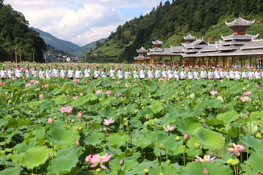 People of Dong ethnic group perform to promote local tourism