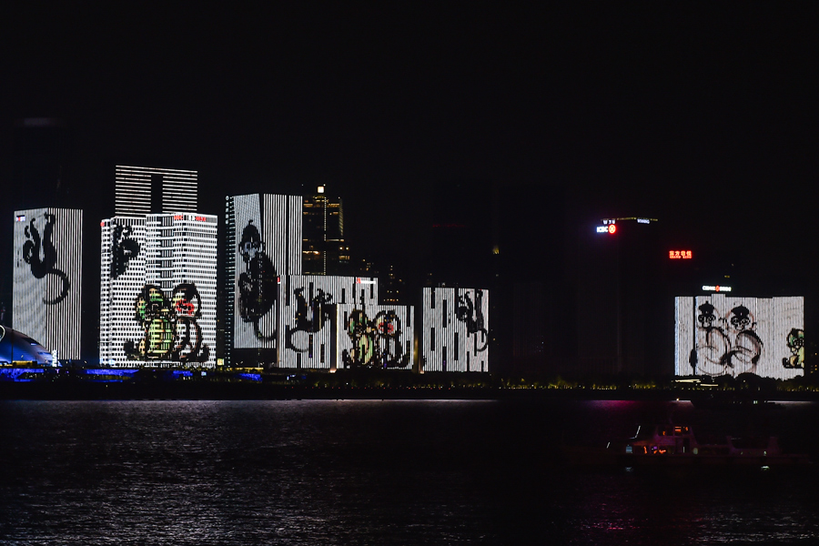 Grand show lights up Qiantang River in Hangzhou