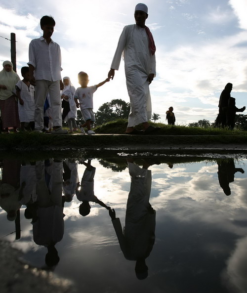 Muslims celebrate Eid al-Adha Festival