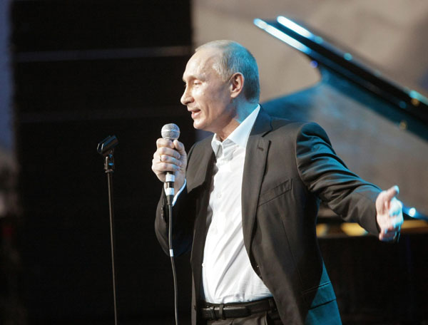 Putin sings, plays piano at charity concert