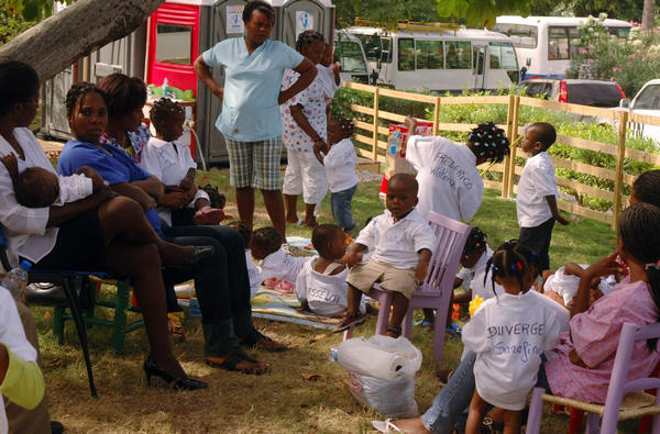 Haitian orphans join adoptive French families