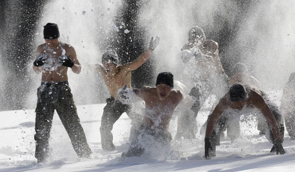 Soldiers go topless in wintry drill