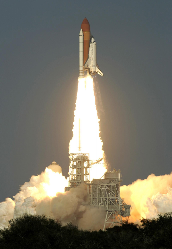 Shuttle Discovery lifts off for last space flight