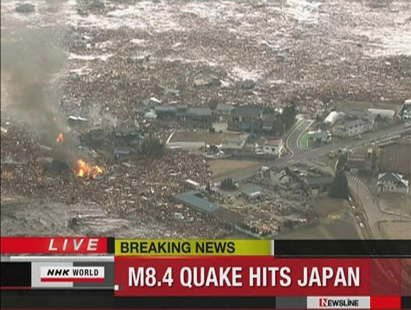 Tsunami hits, one reported dead after Japan quake