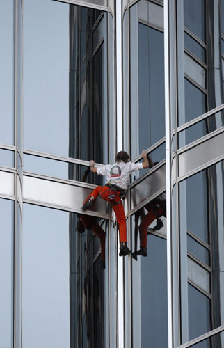 French 'Spiderman' climbs world's tallest tower