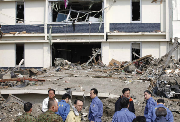 Japanese PM on 1st visit to tsunami-hit villages
