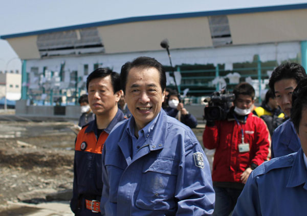 Japan's PM visits fishing city wrecked by tsunami