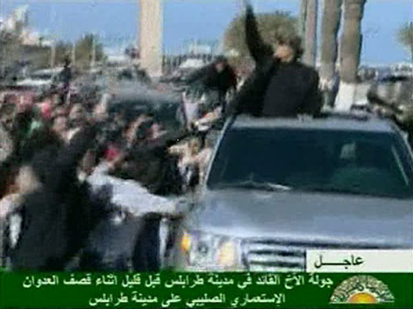 Gadhafi tours Tripoli in open car