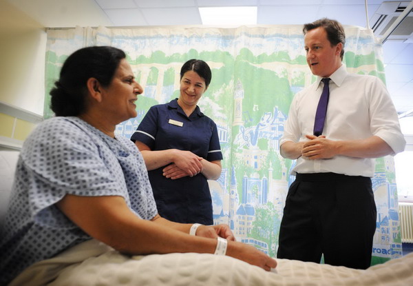 Cameron says health reforms must go ahead