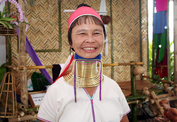 Myanmar women show off copper neckwear