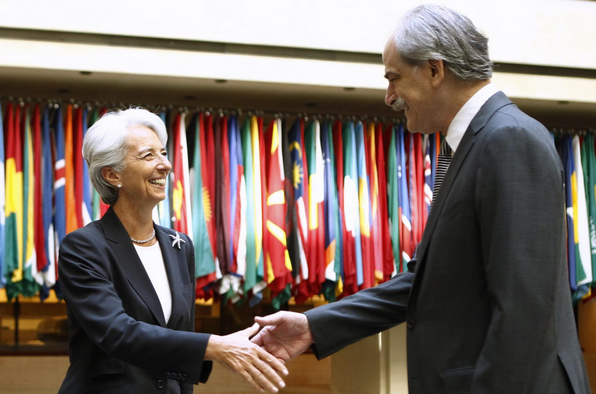 Lagarde signs up to tougher ethics code