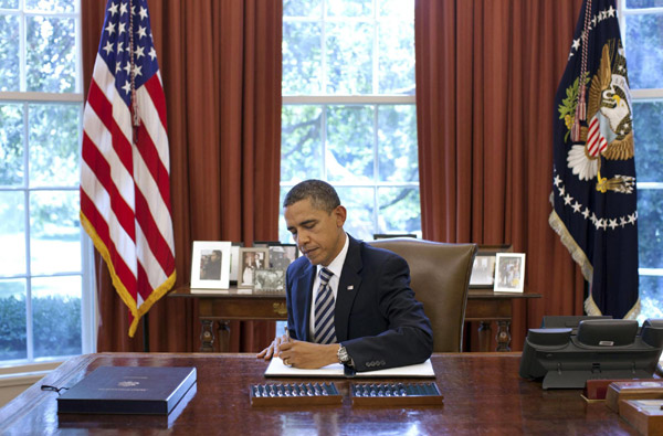 Obama passes bills to raise US debt ceiling
