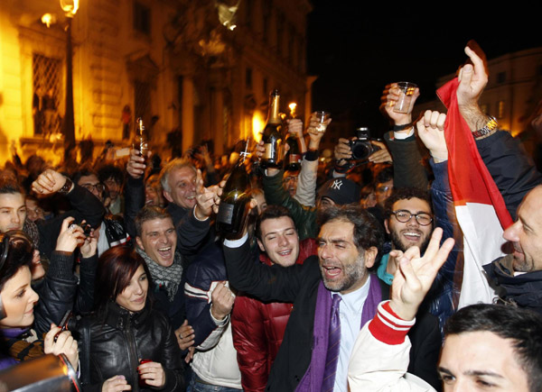 Berlusconi resigns, crowds in Rome celebrate