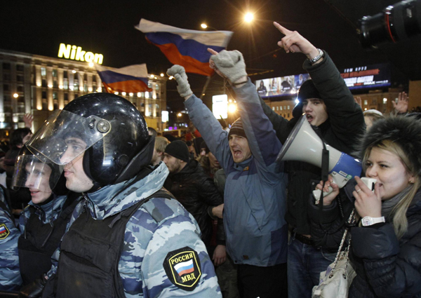 Russian police crack down on anti-Putin protests