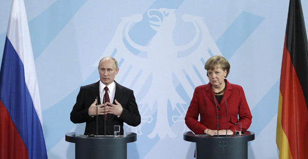 Putin, Merkel favor political solution for Syria crisis