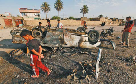 Bomb, gun attacks kill 107 in Iraq