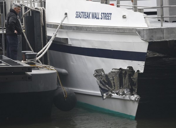 57 injured in NY ferry crash, 2 critical