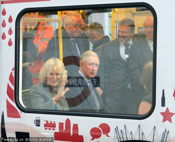 Prince Charles and Camilla surprise 'Tube' passengers